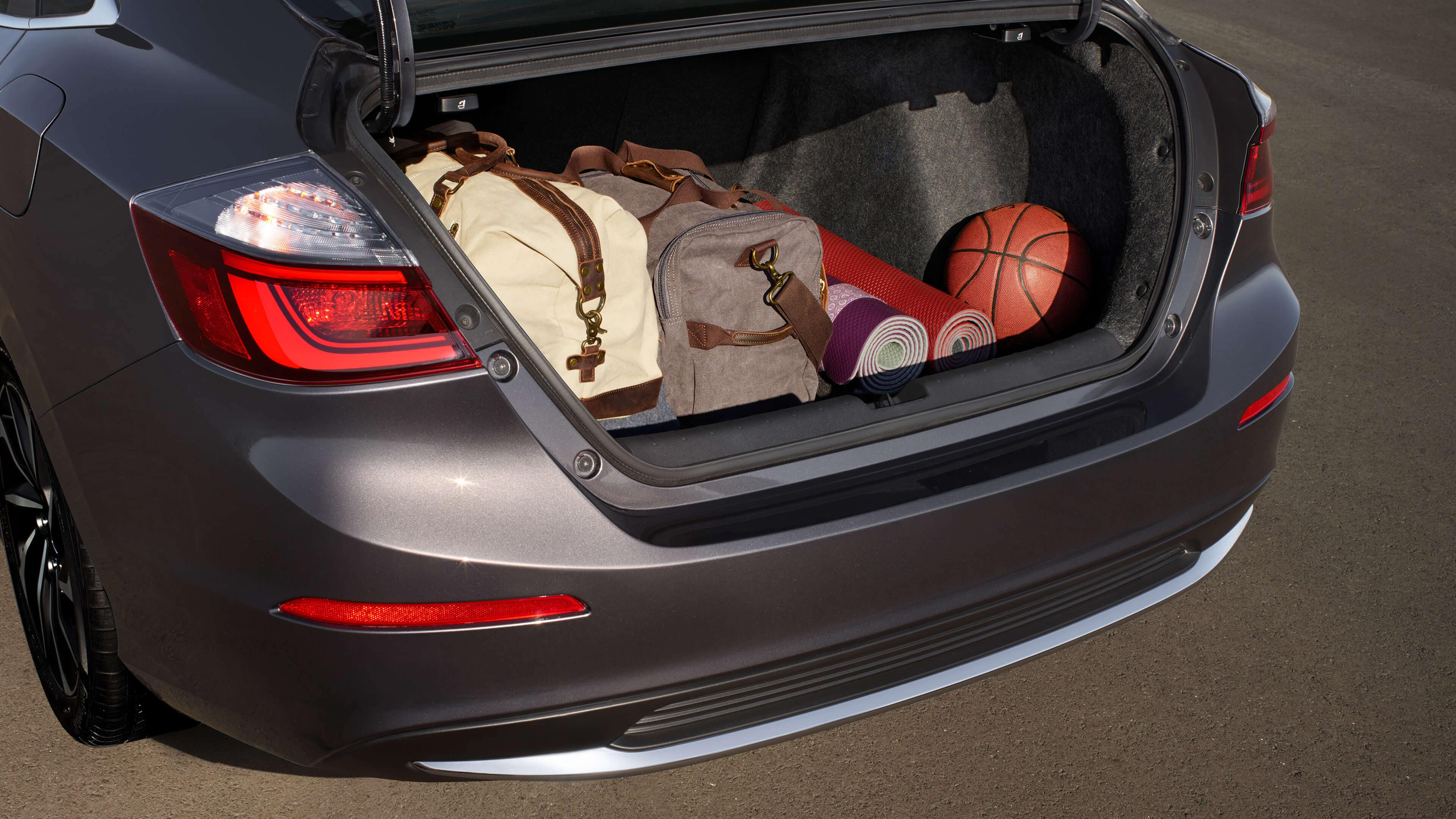 Close-up view of Honda Insight trunk filled with gear